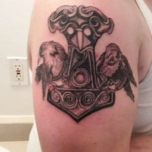 Thors hammer with wisdom and knowledge ravens....my first tattoo
