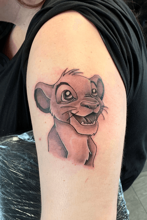 Simba tattoo done a while ago as a part of an on going Disney sleeve