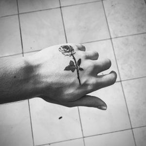 Rose hand tattoo 
