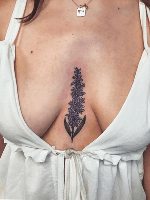 First actual tattoo was on my sternum of a lilac. Has many different meanings to me, but growing up we had lilac bushes in the front and my favorite memory is picking them with my mom, the smell is still like nothing else. I love the way it compliments my body and fits so perfectly. 