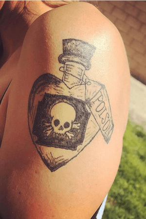Poison bottle tattoo