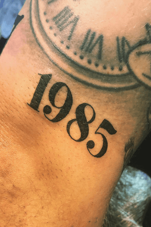 Date of birth in traditional bold font 