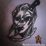 Skull knife tattoo