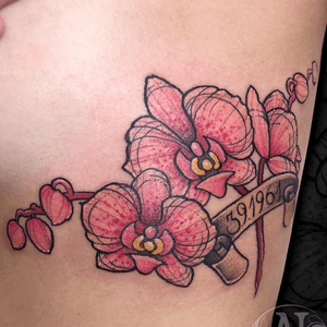 Orchid with birthdate on the rips 