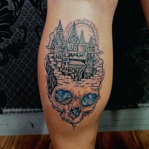 Skull with gothic city and galaxy