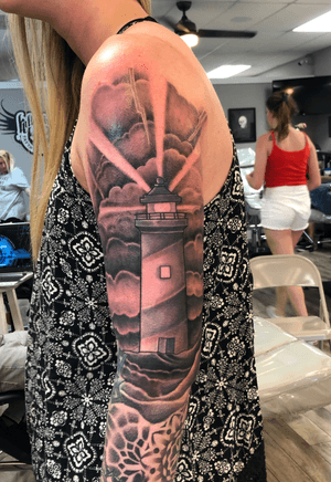 Black and grey lighthouse added to a geo sleeve ! #blackandgrey #lighthouse #hextatcartriges #fusionink #eternalink #tattooartist #tattooart #tattoomodel #dynamicblack #empireink 