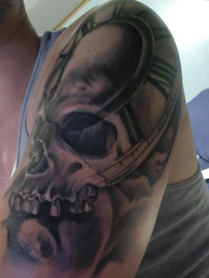 Awesome job by Iven Robinson.SKULL tat