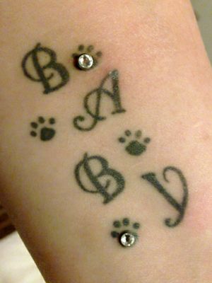 1st tattoo in memoriam of my kitty (2008)
