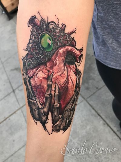 Beautiful forearm tattoo by Alex Santo featuring a realistic heart and jewel sketch design.