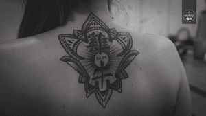 Back side freestyle tattoo