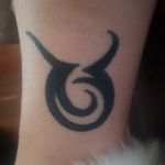 First tattoo, tribal Taurus.