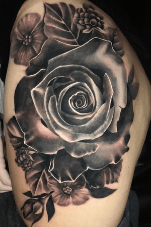 Huge rose piece by @sammysurjaytattoo 