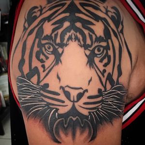 Tattoo uploaded by Smashlee Crashlee • Tribal tiger on the shoulder •  Tattoodo