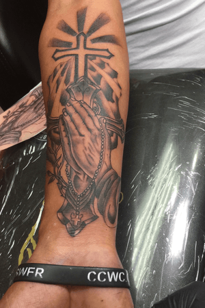 Tattoos by Migo cross fix up an added on bigger cross An prayer hands🙏🏽