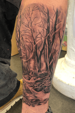 Enchanted forest in calf wraps round onto wolf on opp side 