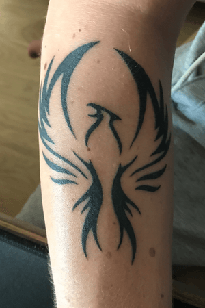 it's a phoenix it represents life after death, and for me a kind of renewal that we can always get by even after the worst defeats in life