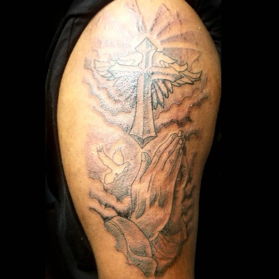 praying hands with cross tattoo