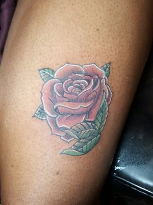 Full color rose tattoo.