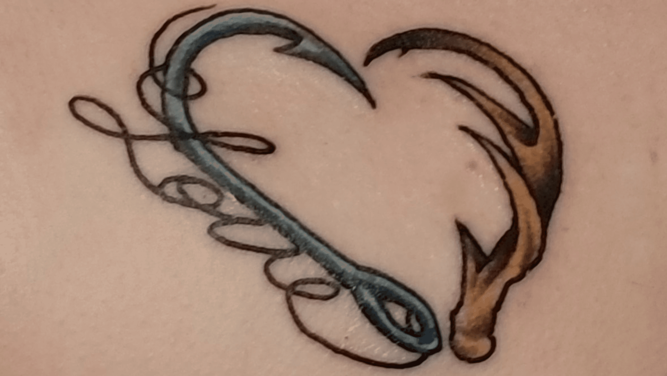 deer antler heart tattoo