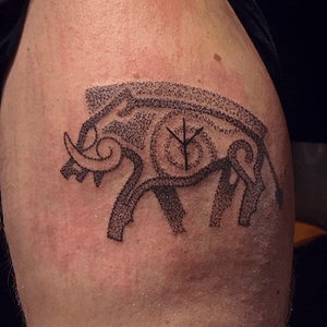 Hand poke wild boar tattoo with Jera rune for protection 