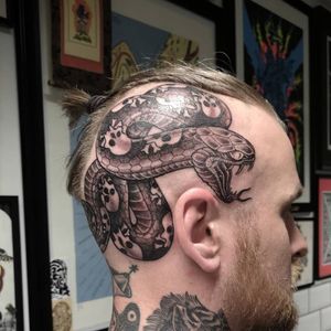 Snake with skull detail on Chris' head!
