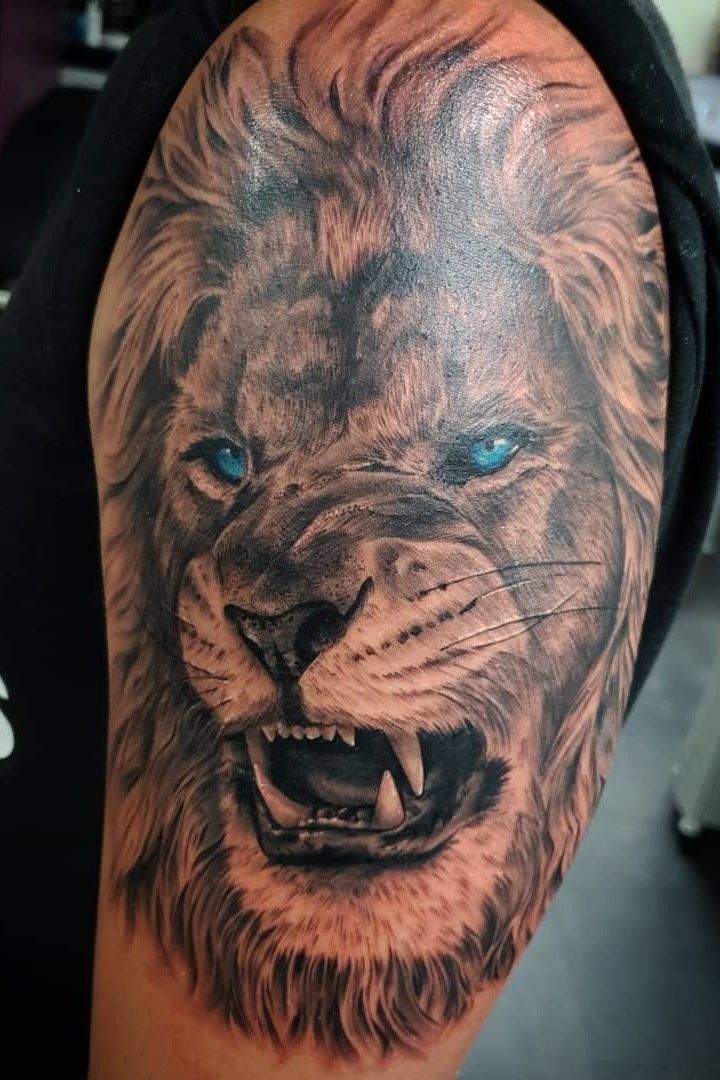20 Back Tattoos for Men That Make a Statement  Lion back tattoo Back  tattoos for guys Lion tattoo design