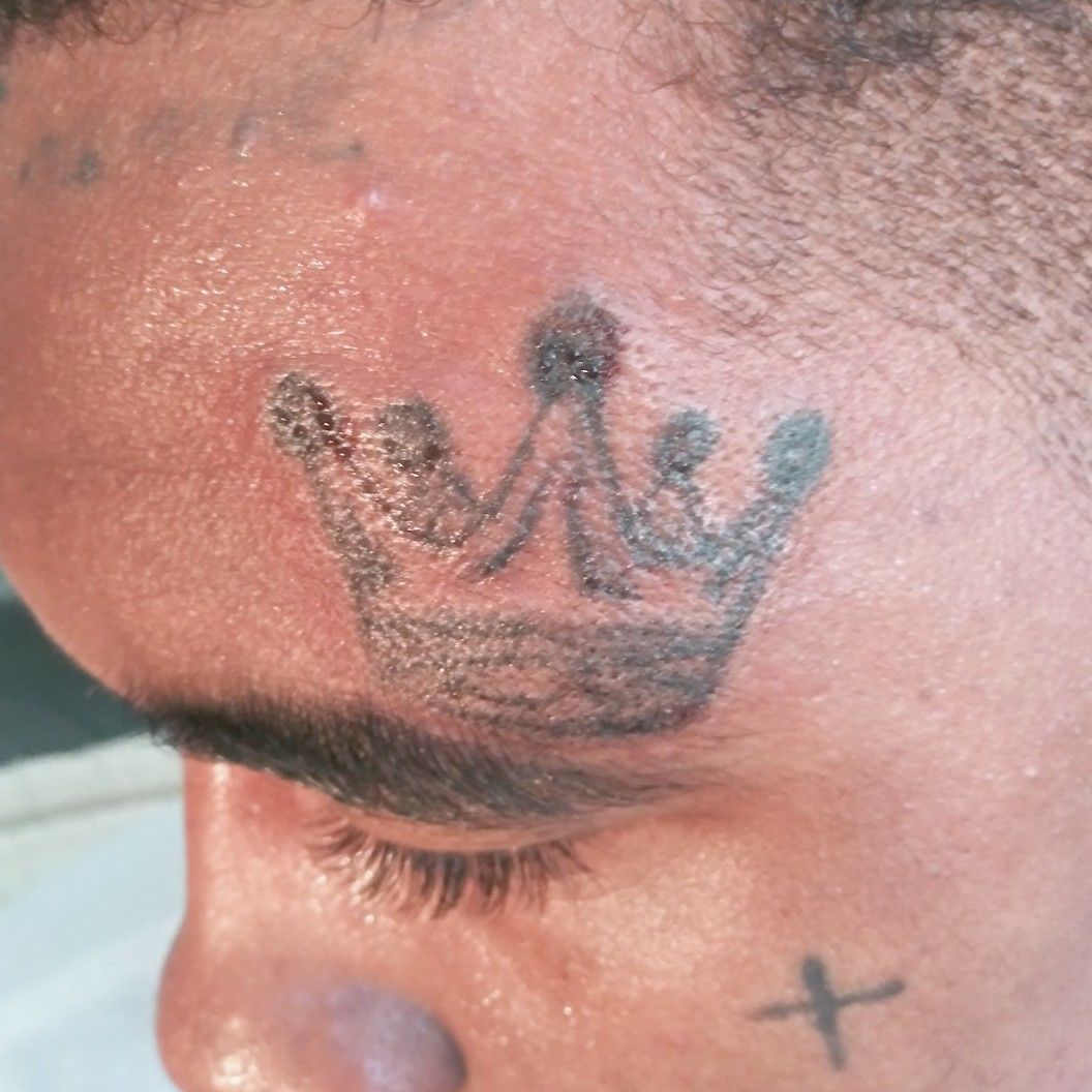 Getting a forehead tattoo is like wearing a crown Wear it with power and  confidence  Face tattoos Hairline tattoos Face tattoos for women