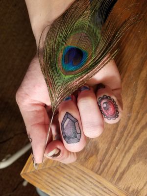 Realistic finger tattoos of jewels/gems 