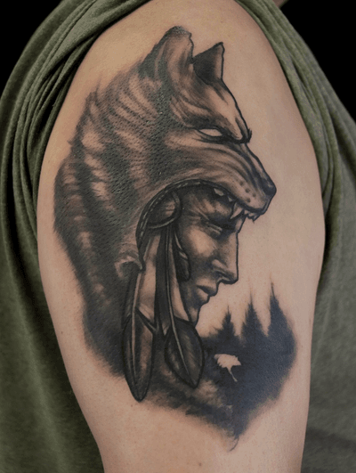 A cool, custom native piece by Josh. #native #americanindian #indian #wolf #wolftattoo #headdress #feather #feathertattoo #nature #tattoodesign #tattooideas