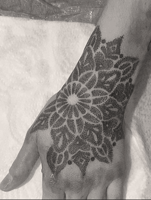 Apprentice tattoo: Handala, tricky placement, black and grey photo to reduce the glare and swelling will post healed when it’s healed 