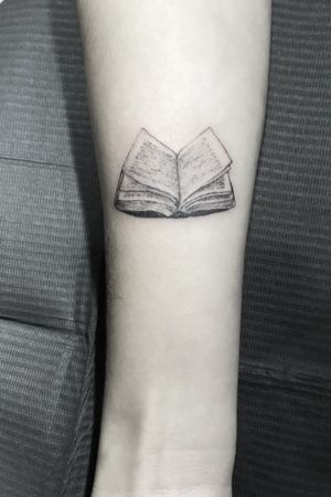 simple open book tattoo
