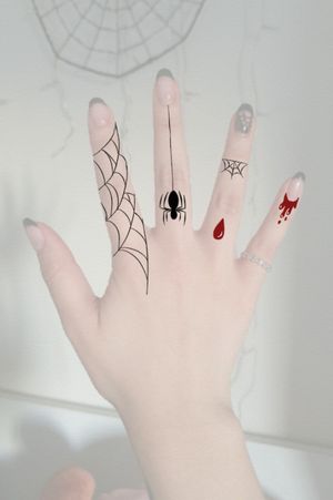 Halloween inspired finger tattoo concepts