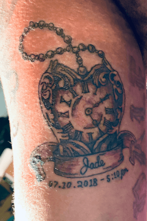 black and grey heart clock tattoo inner arm