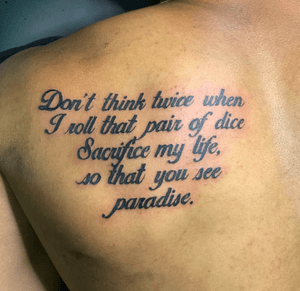 lettering tattoo on back shoulder 
