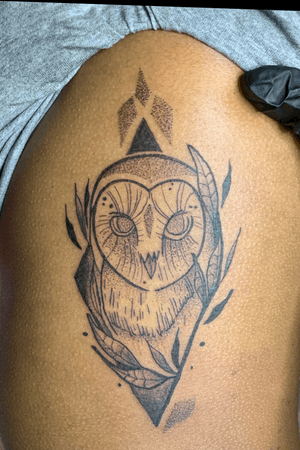 dot style owl tattoo on the ribs 