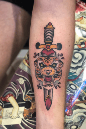 Tiger dagger. Traditional with fine line.