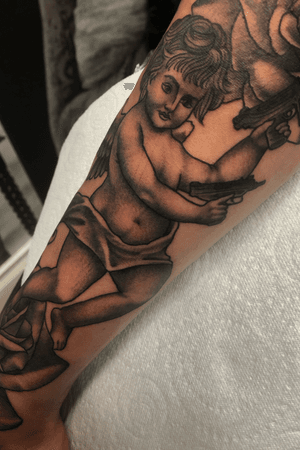 Lil gangster Cupid I tattooed last week 💀 I don’t post most of the black and grey tattoos that come in but if there’s a possibility of an outline on it I’m happy. All tattoos should have an outline!#cupidtattoo #cherubtattoo #angeltattoo #angeltattoos #bngtattoo #bngtattoos #blackandgreytraditional #boldtattoos #boldwillhold #traditionaltattoo #uzi #uzitattoo #dublintattoo #dublintattoostudio #dublintattooartist #irish