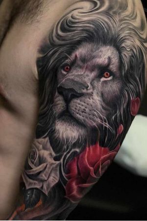 From: tattoo insider#Lion #blackandred #upperarmandshoulder 