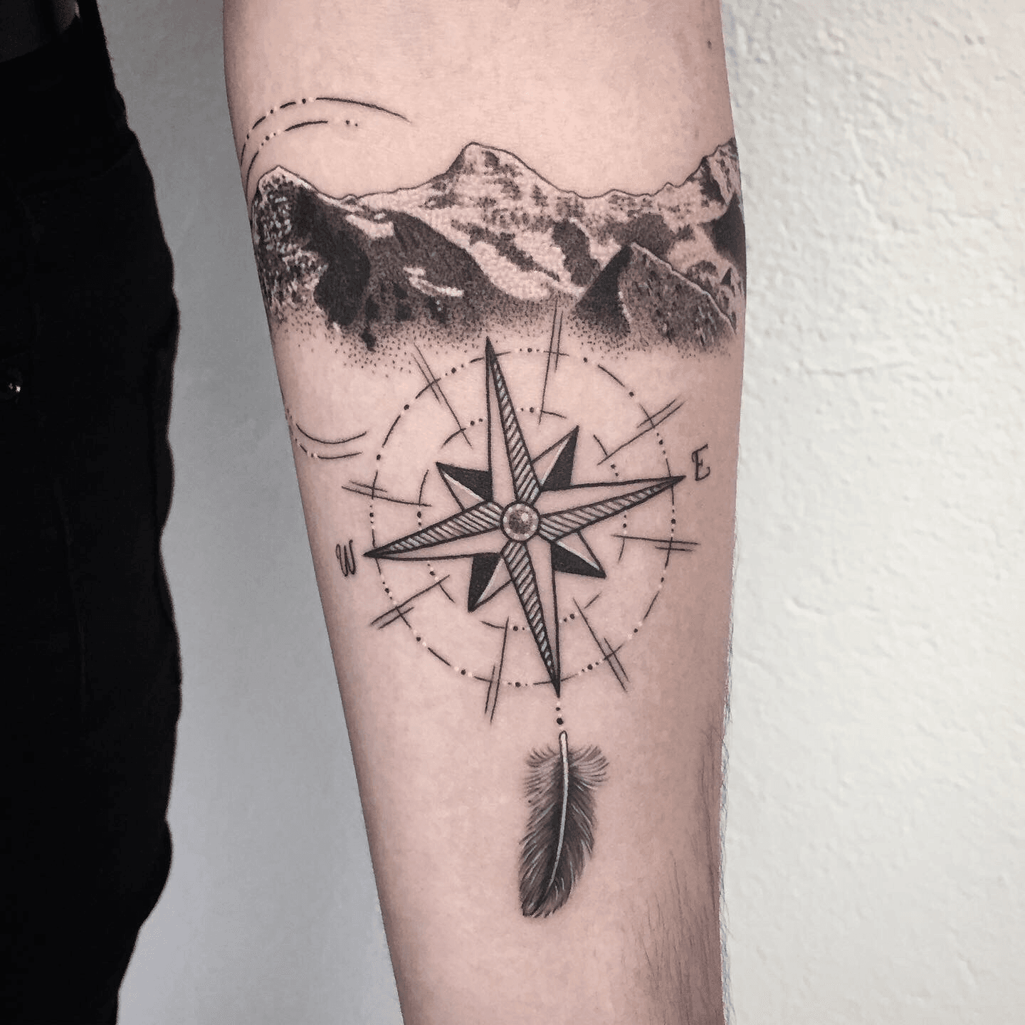 Tattoo uploaded by Orla  Back of shoulder black  grey wanderlust mountains  compass tattoo dreamtattoo mydreamtattoo  Tattoodo
