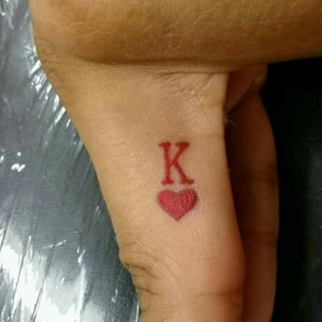 king of hearts tattoo on finger