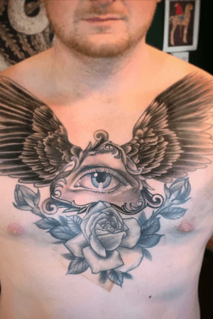 Black and grey chest piece on Ray 