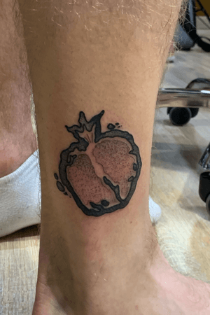 This is a commemorative tattoo of my time studying abroad in Granada, Spain. In Spanish Granada means pomegranate and so that is that this is. I love it and I loved my trip even more 