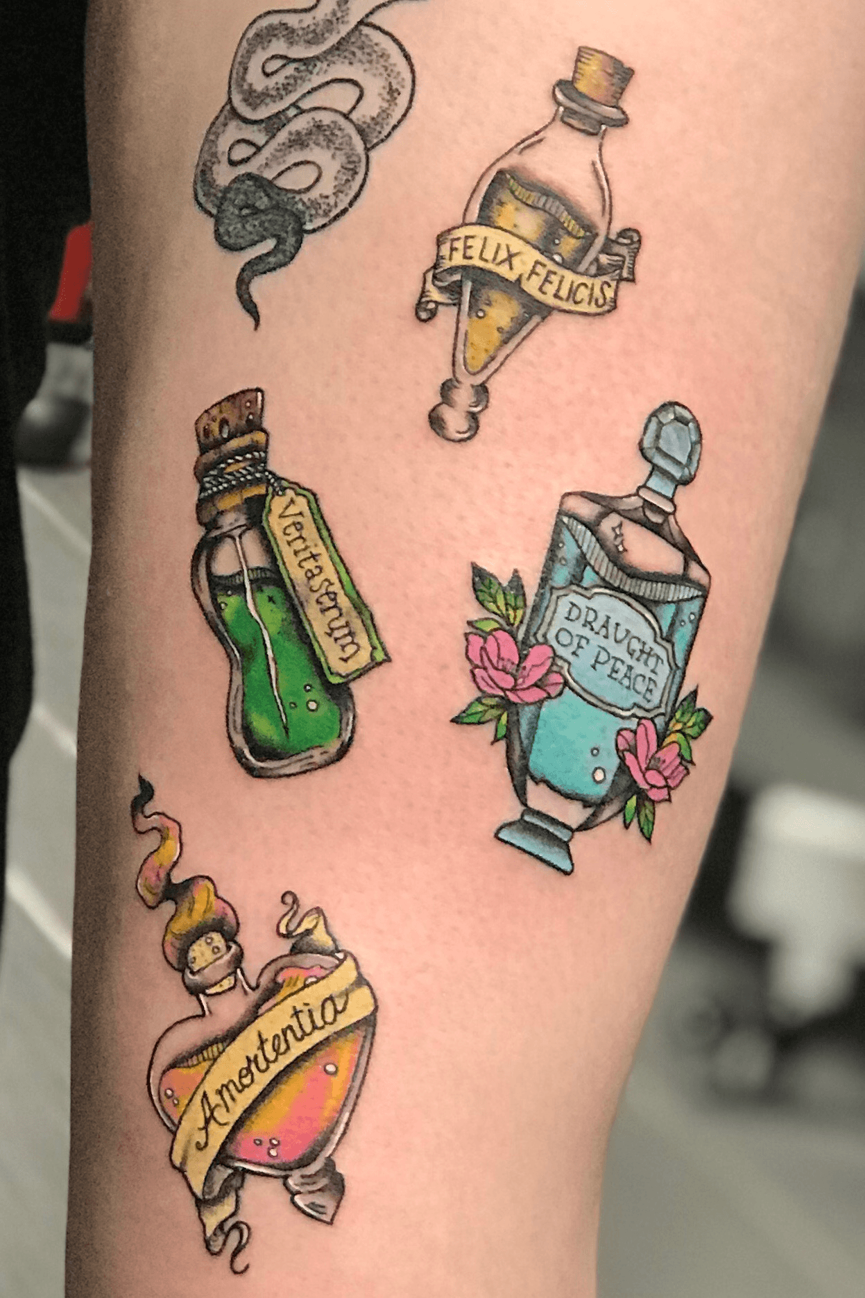 Super fun potion bottle from a while back for Michaela  done at  lygonsttattooco   ca fo  Bottle tattoo Trendy tattoos  Body art tattoos