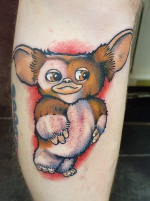 Gizmo the Mogwai from Gremlins on my left calf done by Ballsy at Factotum Body modification in Norwich.