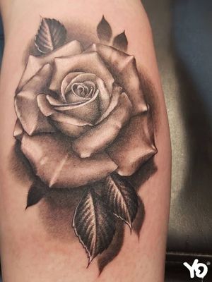 Black and grey realistic tattoo rose 
