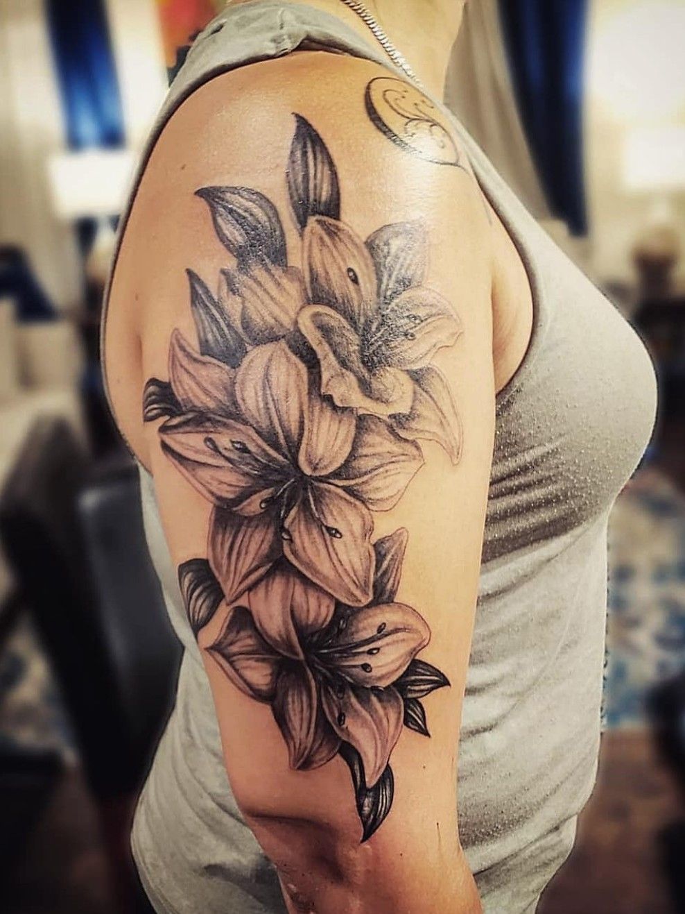 55 Awesome Lily Tattoo Designs  Art and Design  Tattoos for women half  sleeve Half sleeve tattoo Lily flower tattoos