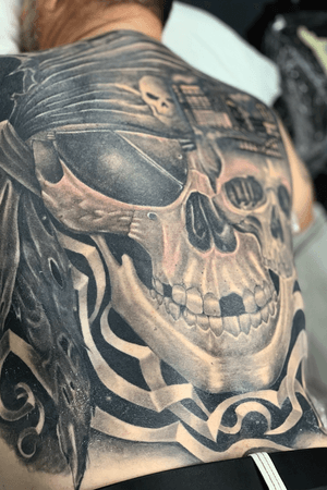 Skull full back piece tattoo