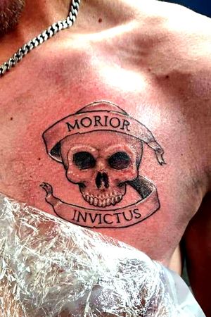 Morior Invictus, Latin for "Remain Unconquerable/unconquered" 
