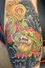 Okinawan Shisa Dog on my left calf. Lineart was originally designed by a friend and had tattooed on in San Angelo, TX. Later colored in and smoke added in Denver, CO by "Wolfman" Frank.
