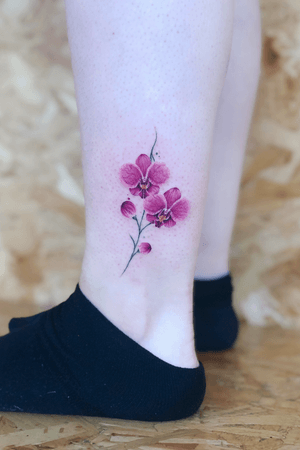 blue orchid foot tattoo